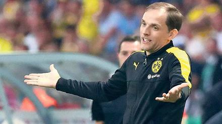 Keine leeren Hände mehr. Thomas Tuchel kann gegenüber der Klubführung von Borussia Dortmund nun auch seinen ersten Titel vorweisen.