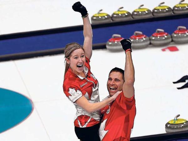 Das kanadische Curling-Paar ist zwar nur rein sportlich ein Paar, holte aber Gold.