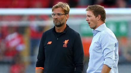 Der kostet. Liverpools Trainer Jürgen Klopp (l.) und Julian Nagelsmann, sehen sich am Mittwoch in Budapest wieder.