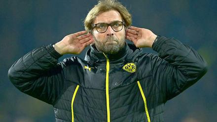 Dortmund-Trainer Jürgen Klopp genießt den Jubel - nach dem Ausscheiden aus der Champions League.