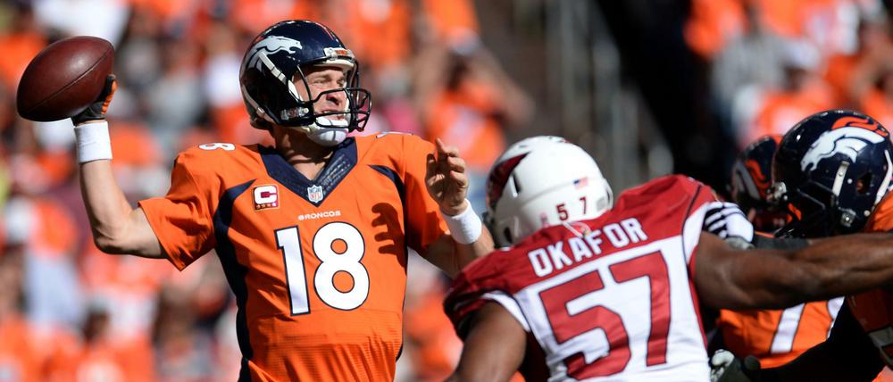 Der große Wurf. Peyton Manning benötigt nur noch drei Touchdown-Pässe, um eine historische NFL-Bestmarke zu verbessern. 