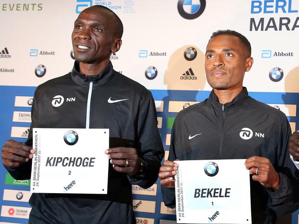 Schnelle Männer. Marathonläufer Eliud Kipchoge (Kenia, l) und Kenenisa Bekele (Äthiopien) gelten als die besten Marathon-Läufer ihrer Zeit. 