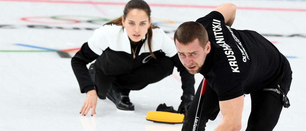 Mit Doping zum Erfolg? Im Mixed-Wettbewerb holte Alexander Kruschelnizki mit seiner Ehefrau Anastassija Brysgalowa Bronze. Doch war er gedopt? 