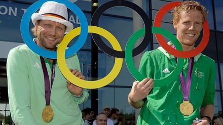 Im Kreise der Großen. Julius Brink und Jonas Reckermann (rechts) nach ihrem Olympiasieg in London.