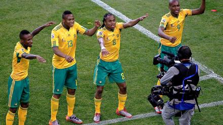 Die Spieler Südafrikas versuchen, sich von der Euphorie tragen zu lassen.
