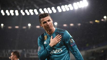 (FILES) In this file photo taken on April 03, 2018 Real Madrid&amp;apos;s Portuguese forward Cristiano Ronaldo celebrates his second goal during the UEFA Champions League quarter-final first leg football match between Juventus and Real Madrid at the Allianz Stadium in Turin.Real Madrid announced on July 10, 2018 Cristiano Ronaldo&amp;apos;s transfer to Juventus. / AFP PHOTO / Marco BERTORELLO