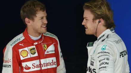 Beim Grand Prix von Brasilien startet Sebastian Vettel (l.) von der dritten Position aus. Trainingsschnellster war am Samstag Nico Rosberg (r.)