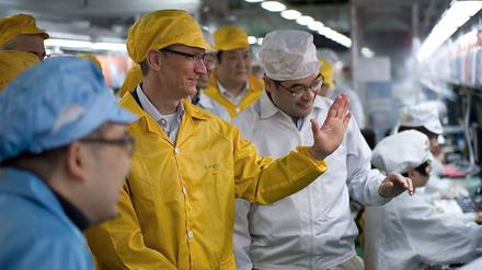 Apple-Chef Tim Cook hat das chinesische Foxconn-Werk, das jetzt wegen Arbeiterunruhen Schlagzeilen macht, im März besucht.