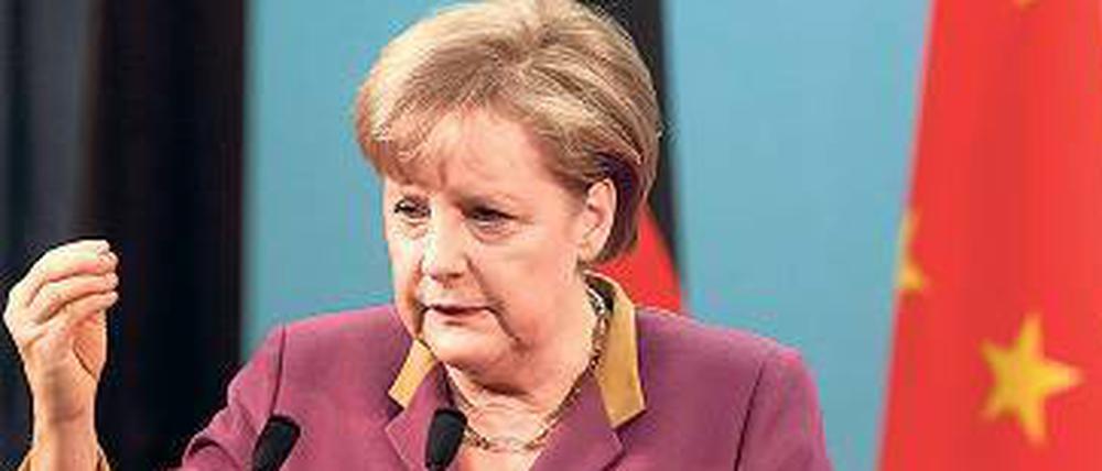 Farbspiele. Die Kanzlerin Angela Merkel hat im Laufe ihrer Amtszeit weder ihre Frisur noch ihren Stil gewechselt - aber immer wieder die Farbe ihres Blazers. 