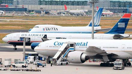 Gemeinsam auf dem Rollfeld. Künftig wollen Continental und United zusammen 144 Millionen Passagiere befördern.