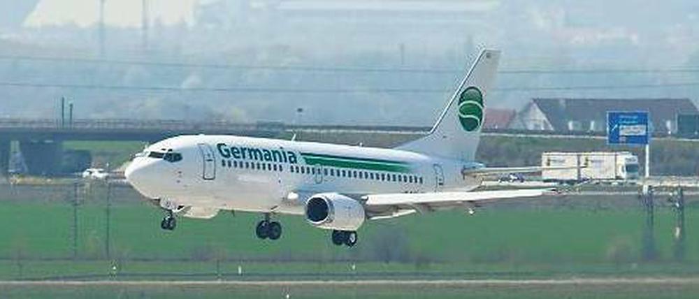 Grün-weißes Markenzeichen. Germania beförderte 2,2 Millionen Passagiere, 300.000 weniger als 2009. Trotzdem schrieb das Unternehmen schwarze Zahlen.