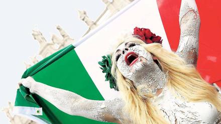 Der Protest hat geholfen. Auch Frauengruppen demonstrierten in Rom gegen Berlusconi. Sein Rücktritt steht nun bevor. 