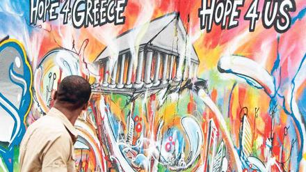 Die Hoffnung der Anderen. Der Ausgang des Urnengangs in Athen entscheidet womöglich auch über die Zukunft der anderen Euro-Krisenländer, wie dieses Graffiti in Lissabon deutlich macht. 