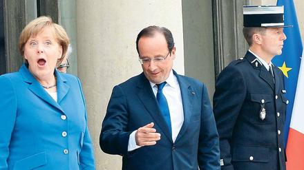 Oh lala! Angela Merkel wird es freuen, dass ihr wichtigster Partner François Hollande nun mit dem Sparen beginnen will. Foto: dpa