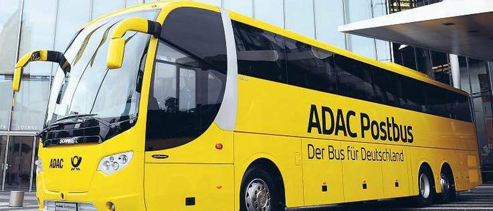 Abfahrbereit. Vor der Konzernzentrale der Deutschen Post in Bonn werden die Busse nun häufiger stehen. Foto: dpa