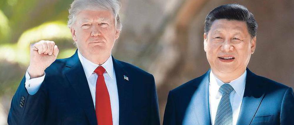Das Recht des Stärkeren. US-Präsident Trump (l.) provoziert Chinas Staatschef Xi Jinping mit der Androhung von Strafzöllen. China reagiert mit Gegenmaßnahmen. 