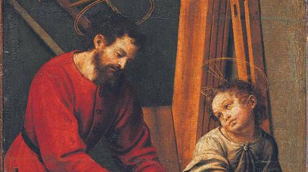 Heiliges Handwerk. Das mittelalterliche Gemälde zeigt Joseph und das Christuskind in der Werkstatt. Im Matthäus-Evangelium, Kapitel 13, Vers 55 steht über Jesus geschrieben: „Ist das nicht der Sohn des Zimmermanns?“.