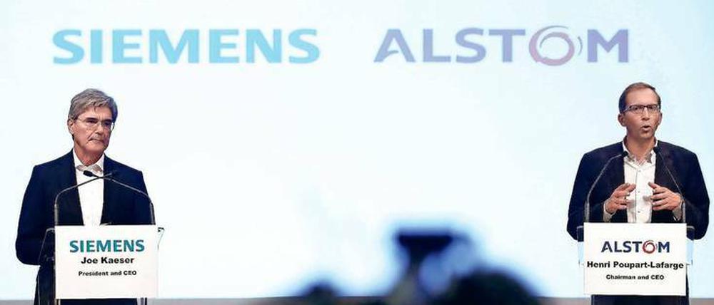 Im September 2017 stellten Siemens-Vorstandschef Joe Kaeser (li.) und sein Alstom-Kollege Henri Poupart-Lafarge in Paris die geplante Fusion vor. Beide Unternehmen müssen sich nun Alternativen suchen. Bei Siemens ist ein Börsengang der Schienenfahrzeugsparte möglich oder vielleicht doch noch eine Kooperation mit Bombardier. 