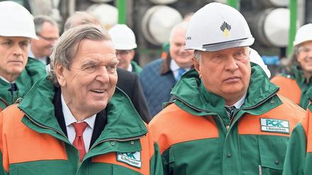 Freunde Putins. Rosneft-Chef Igor Setschin, hier mit seinem Aufsichtsratschef Gerhard Schröder, erntet in Russland Kritik von Energieexperten und Wettbewerbern. 