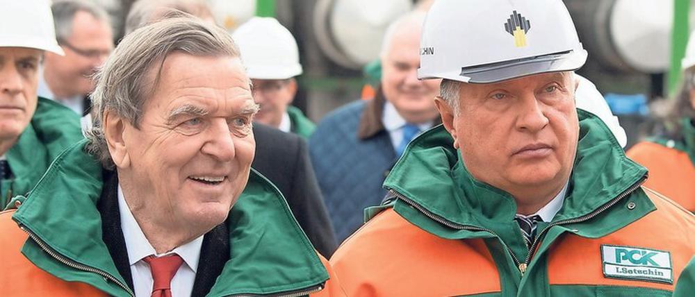 Freunde Putins. Rosneft-Chef Igor Setschin, hier mit seinem Aufsichtsratschef Gerhard Schröder, erntet in Russland Kritik von Energieexperten und Wettbewerbern. 