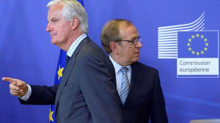 Wo gehts lang? Der finnische Notenbanker Liikanen (r.) und sein Auftraggeber, EU-Kommissar Barnier, stellen den Bericht in Brüssel vor.