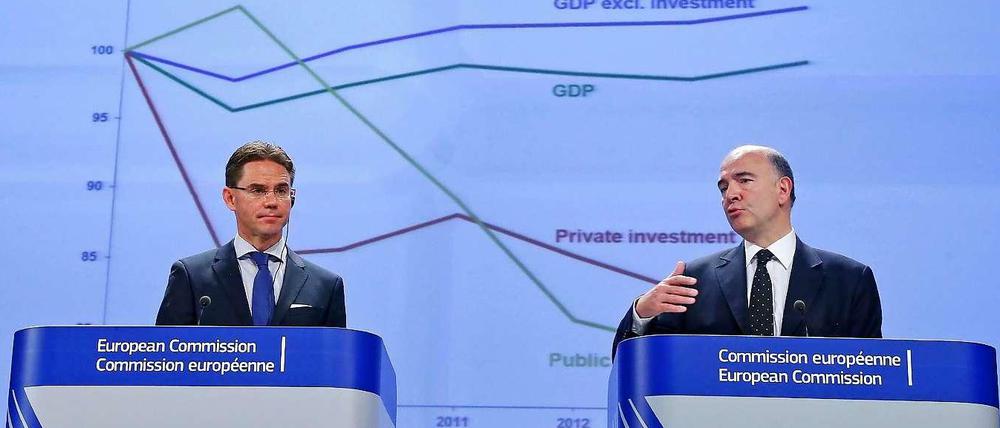 EU-Wachstumskommissar Jyrki Katainen (links) und Wirtschafts- und Finanzkommissar Pierre Moscovici haben bei ihrem ersten Auftritt in ihrem neuen Amt nicht sehr gute Nachrichten mitgebracht. 