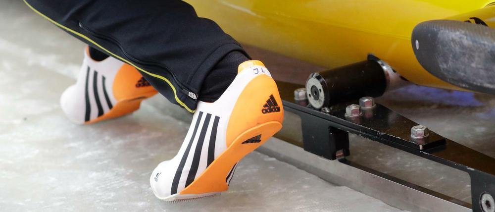 Bob-Fahrer Johannes Lochner trägt Adidas bei Olympia in Pyeongchang.