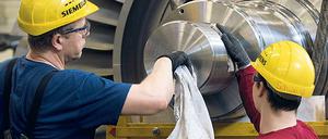 Auch die Mitarbeiter im Siemens-Gasturbinenwerk Berlin werden Urlaub nehmen oder Gleitzeitkonten abbauen müssen. Das Ziel: Kosten sparen.