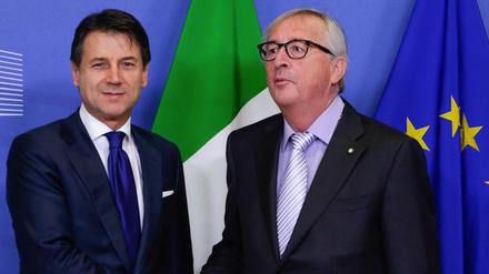Jean Claude Juncker, EU-Kommissionschef und Giuseppe Conte, Italiens Regierungschef. 