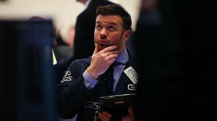 Ein Trader an der New York Stock Exchange (NYSE) am Donnerstag vor dem Schlussgong. 