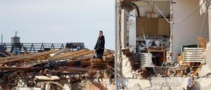 Ein Mann steht in einem beschädigten Haus nach dem Tornado, das mehrere tschechische Gemeinden zerstört hat.
