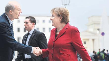 Bundeskanzlerin Angela Merkel 2012 mit Hans Joachim Schellnhuber vom Potsdam-Instituts für Klimafolgenforschung.
