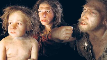 Skepsis im Blick. Rekonstruktion einer Neandertaler-Familie auf der Basis französischer Fossilienfunde, 36 000 bis 70 000 Jahre alt. Fotos: Focus/SPL und dpa