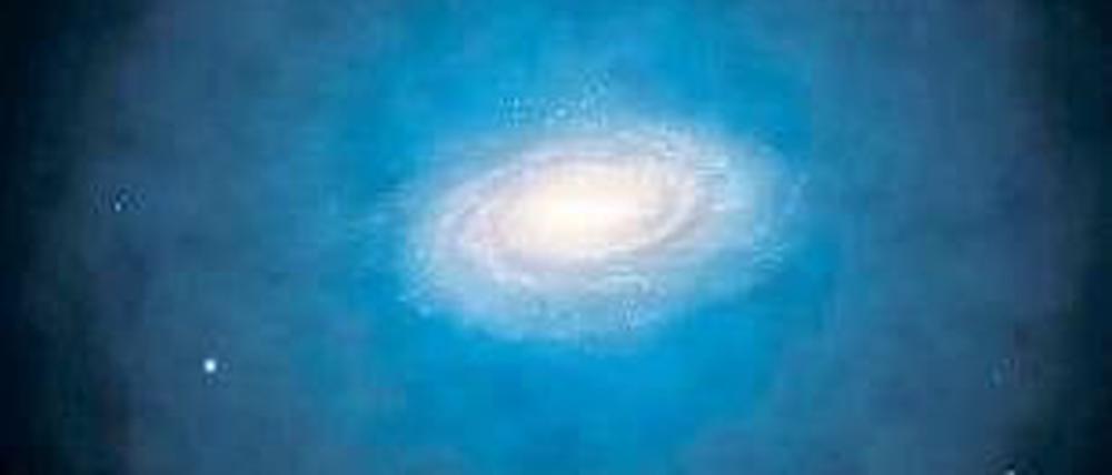 Sichtbar gemacht. Animation der Dunklen Materie (blau) um eine Spiralgalaxie, ähnlich unserer Milchstraße. Foto: dpa