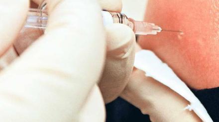 Nur ein Piks. Forscher suchen nach einem Impfstoff gegen jede Grippe.