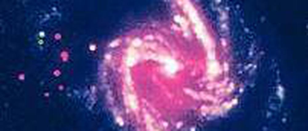 Galaxie im Röntgenlicht. NGC 1365 ist 60 Millionen Lichtjahre entfernt. Diese Aufnahme basiert auf kombinierten Daten der Weltraumteleskope "XMM-Newton" und "Nustar".