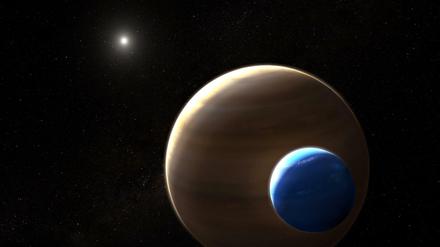 Die Illustration eines Künstlers zeigt den Planeten Keppler-1625b und seinen Mond in einem fremden Sonnensystem.