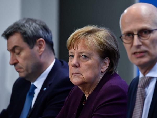 Angela Merkel, Markus Söder und Hamburgs Bürgermeister Peter Tschentscher. 