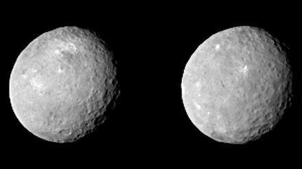 Helle Flecken. Die Aufnahme zeigt die Oberfläche von Ceres, aufgenommen im Februar. Auffallend sind die hellen Flecken. Dabei könnte es sich um frei gelegtes Eis handeln oder um die Schlote von "Eisvulkanen", vermuten Forscher. Wenn "Dawn" Ceres näher kommt, wird sich das Rätsel aufklären. 